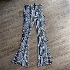 Curve hugging bell bottom pants